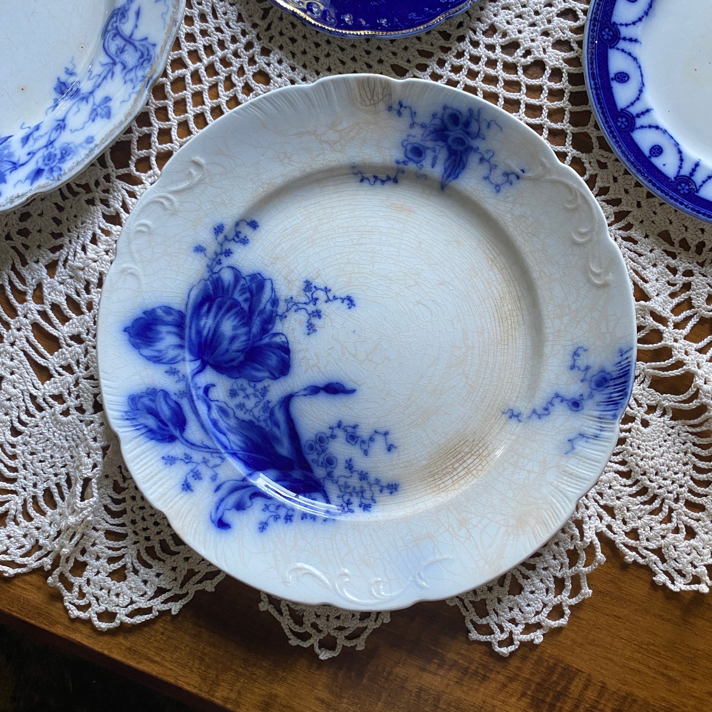 Semi Porcelain Flow Blue Plate by Johnson Brothers, Tulip Pattern